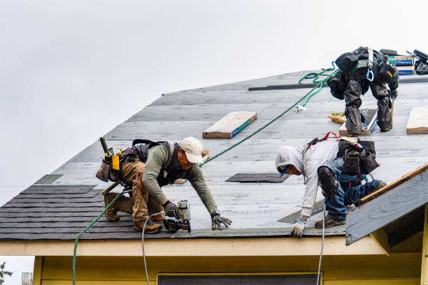 Professional Gutter Installation technician working in Adamsville, PA